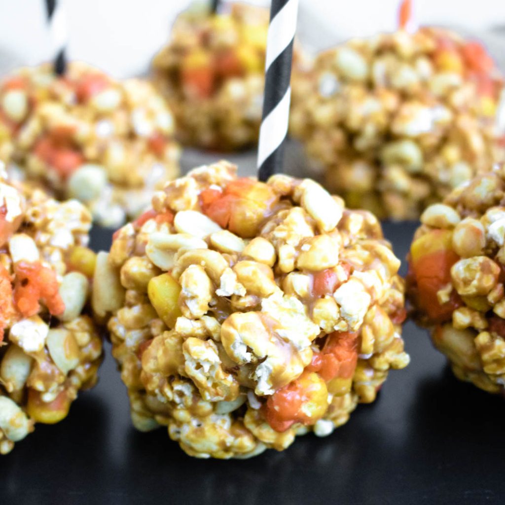 Candy Corn Popcorn Balls HalloweenTreatsWeek Sweet Beginnings Blog